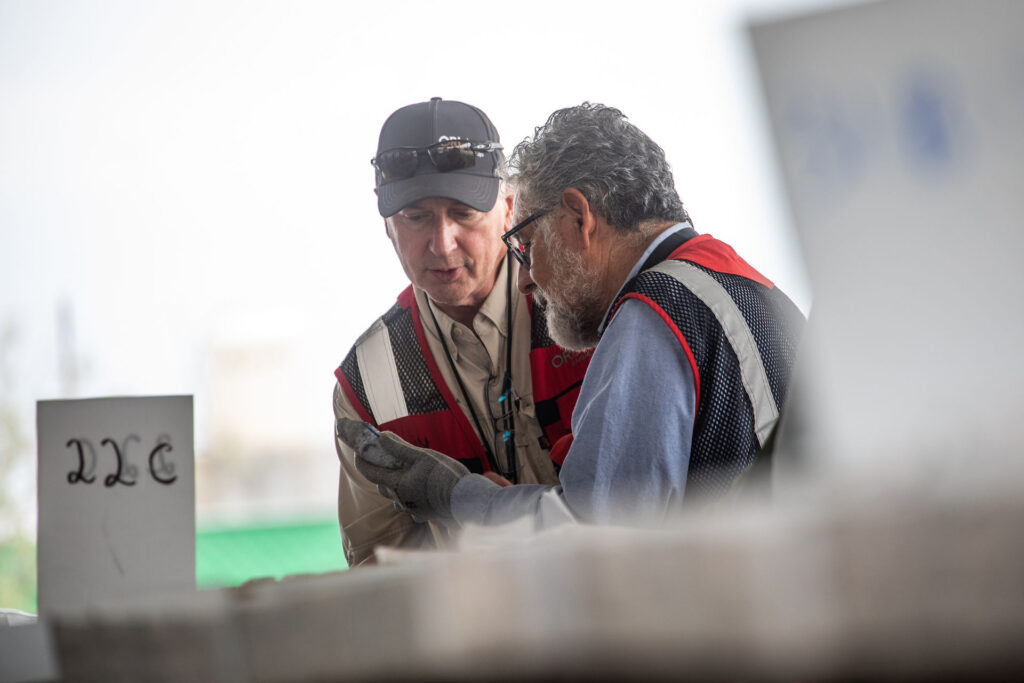 VP Exploration Sylvain Guerard inspecting core